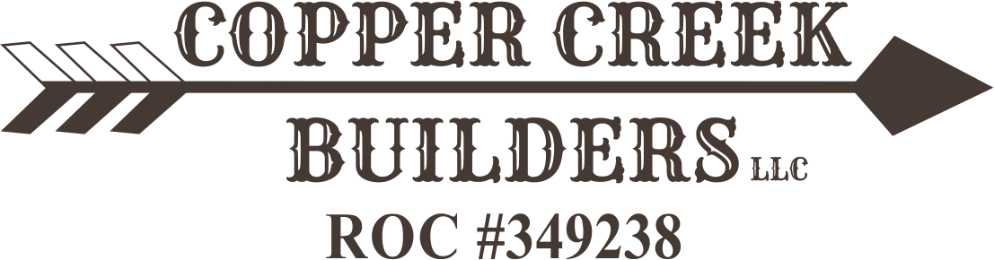 A green and brown banner with the words cooper creek builders in large block letters.